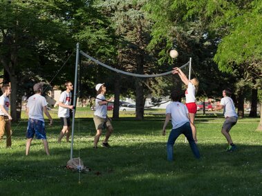 Summer research scholars playing volleyball