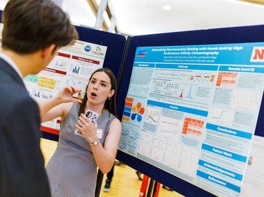 summer research program scholar presenting at symposium