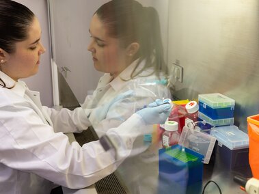 Summer Research Scholar doing research in lab