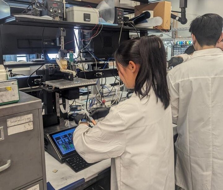 2023 REU scholar working on her summer research in soft robotics.